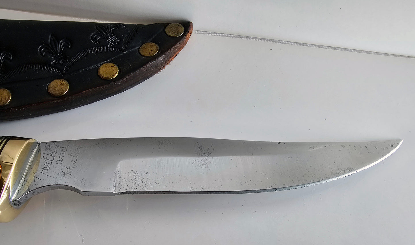 Vintage North and Prater January 1989 10 1/4" Blade Crown Stag Handle with original Leather Sheath