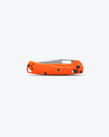 Benchmade 15533 Mini Taggedout closed showing 4.10 inch profile with orange Grivory handle and mini deep-carry clip — ClassicBlades