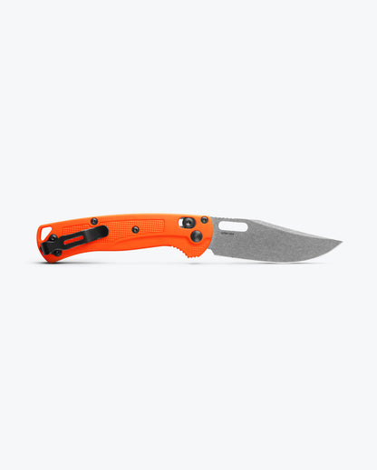 Benchmade 15533 Mini Taggedout orange Grivory handle with grip texture and AXIS Lock detail — ClassicBlades