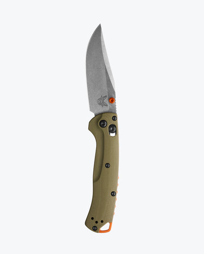 Benchmade 15534 Mini Taggedout OD green G10 handle with orange anodized thumb stud, barrel spacers and backspacer detail — ClassicBlades