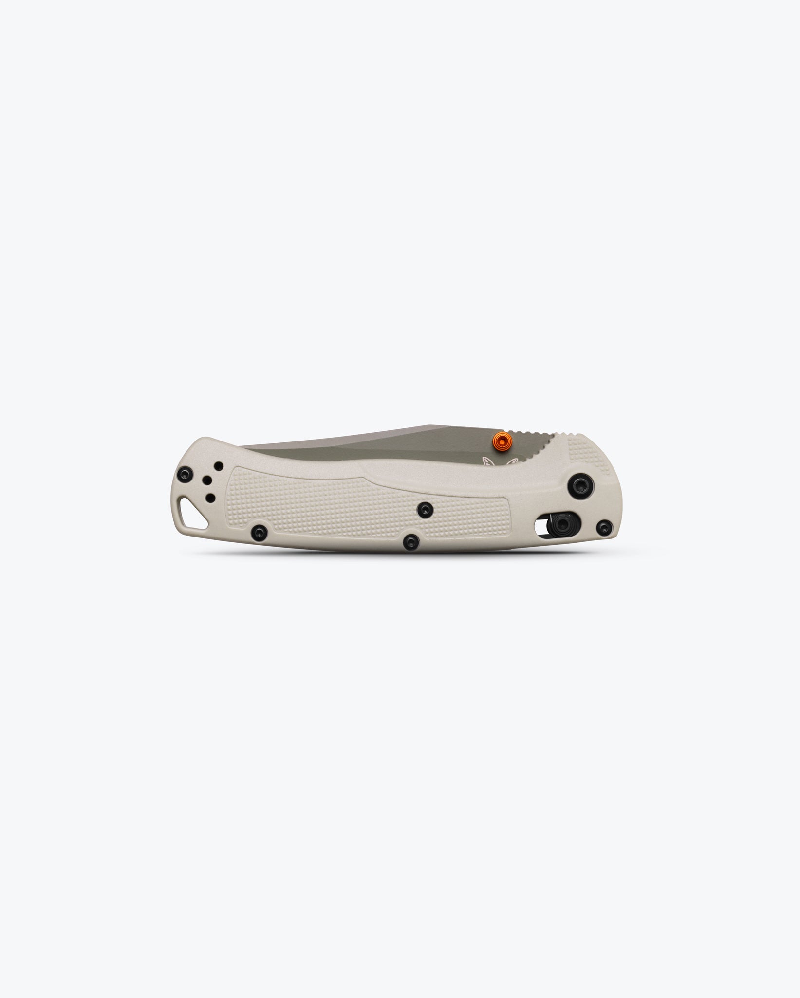 Benchmade 15536GN-01 Taggedout closed with tan Grivory handle and deep-carry pocket clip — ClassicBlades