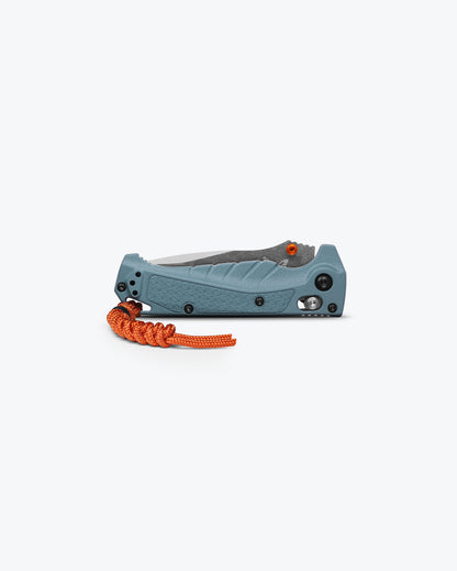 Benchmade 18065S Mini Adira closed showing 4.25 inch profile with depth blue handle and black oxide deep-carry pocket clip — ClassicBlades
