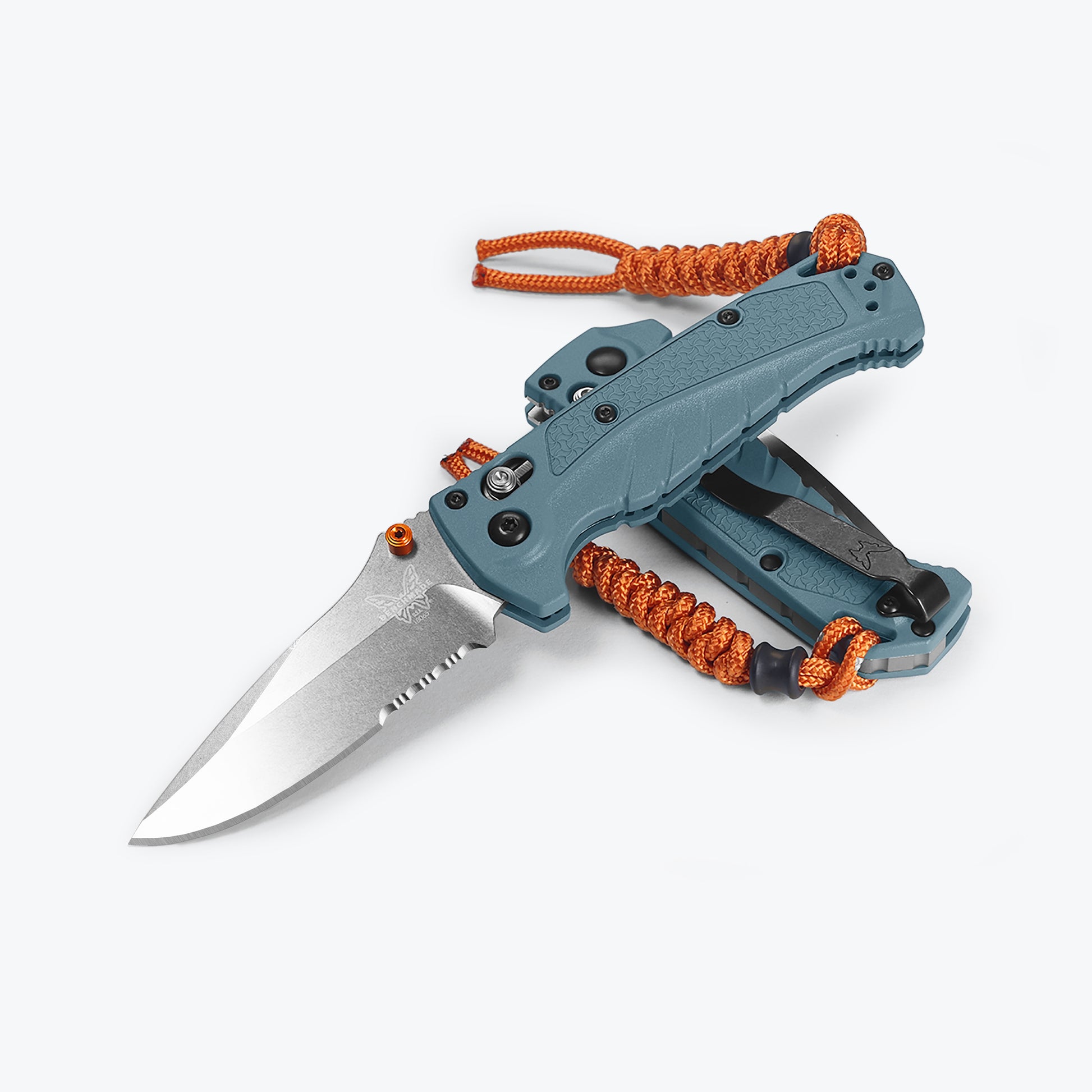 Benchmade 18065S Mini Adira serrated folding knife with depth blue Grivory handle and orange anodized thumb stud — ClassicBlades