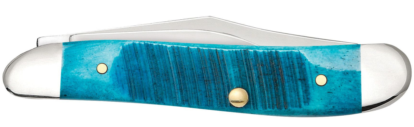 Case 25596 Caribbean Blue Bone Peanut sawcut jigged handle detail showing brilliant azure color and nickel silver bolsters — ClassicBlades