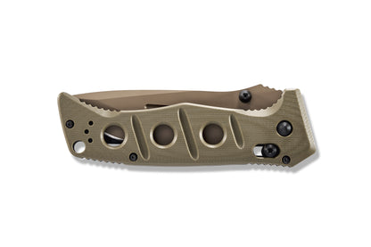 Benchmade 275 Adamas knife on tactical gear, rugged and reliable for field use
