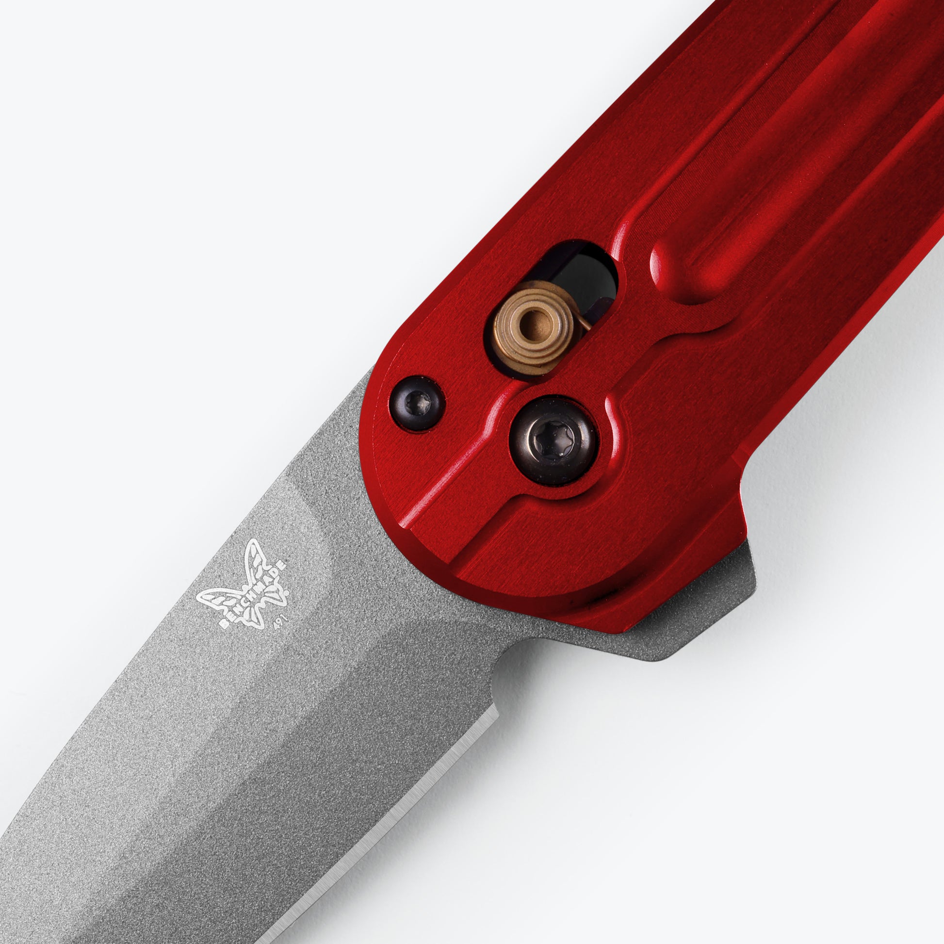 Benchmade 491GY-01 Lowden Close-up of milled Phoenix Red anodized 6061-T6 aluminum handle with AXIS Lock and flipper tab — ClassicBlades