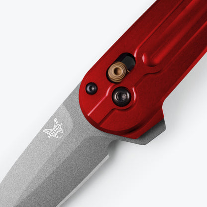 Benchmade 491GY-01 Lowden Close-up of milled Phoenix Red anodized 6061-T6 aluminum handle with AXIS Lock and flipper tab — ClassicBlades