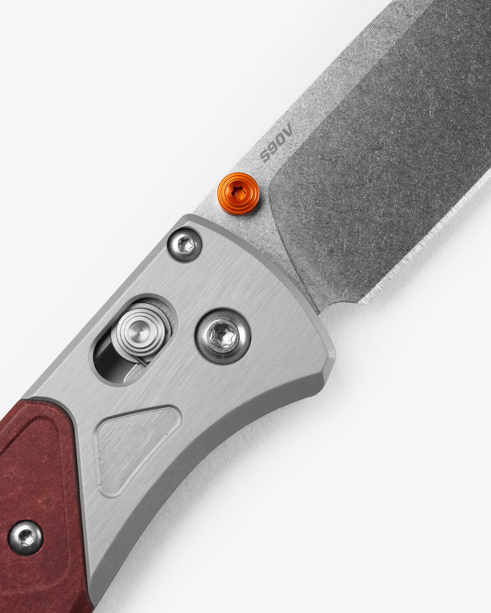 Benchmade 535-09 Bugout with orange anodized thumb stud and backspacer detail — ClassicBlades