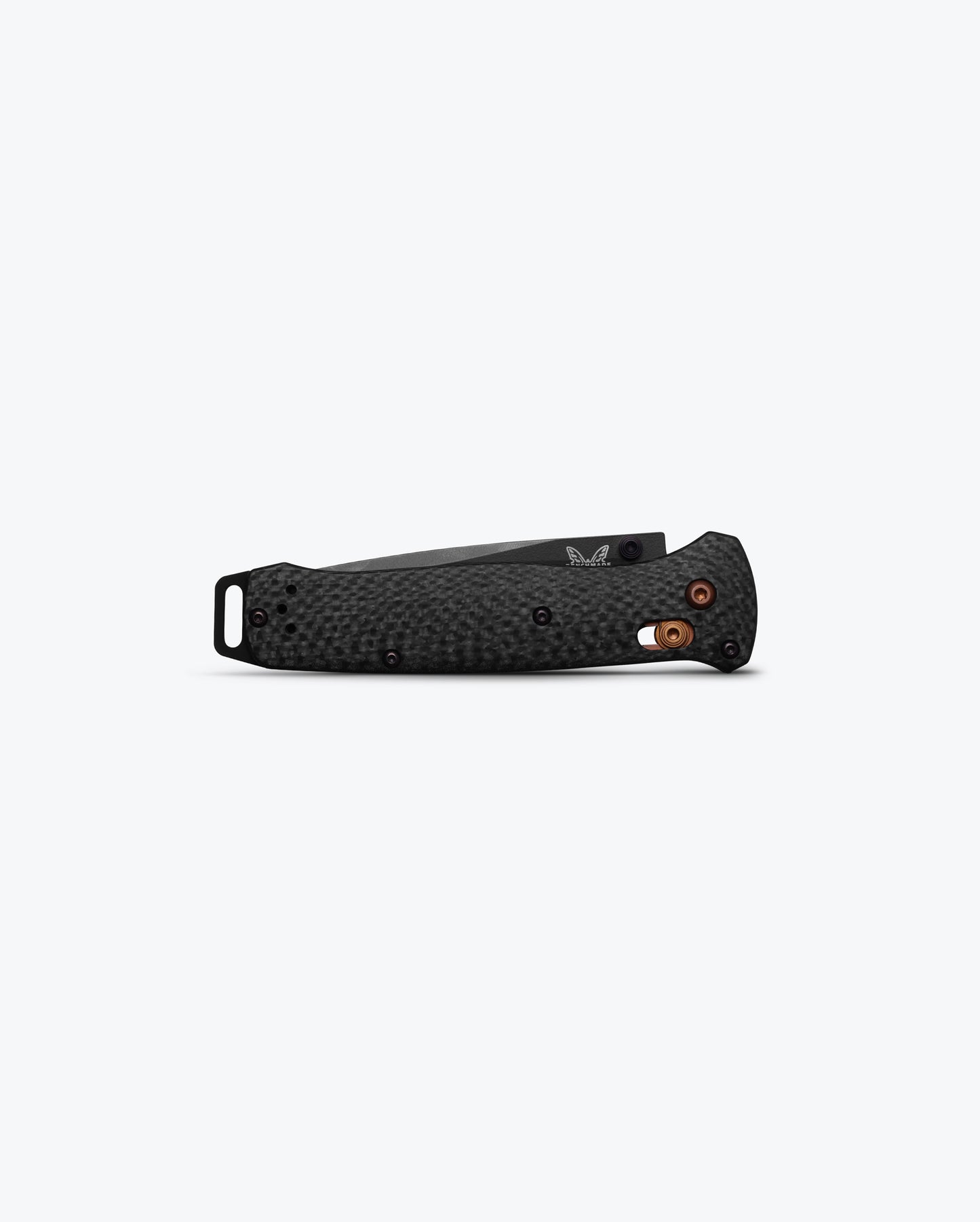 Benchmade 537BK-10 Bailout diamond-textured carbon fiber handle showing dark copper AXIS Lock and aluminum pommel detail — ClassicBlades