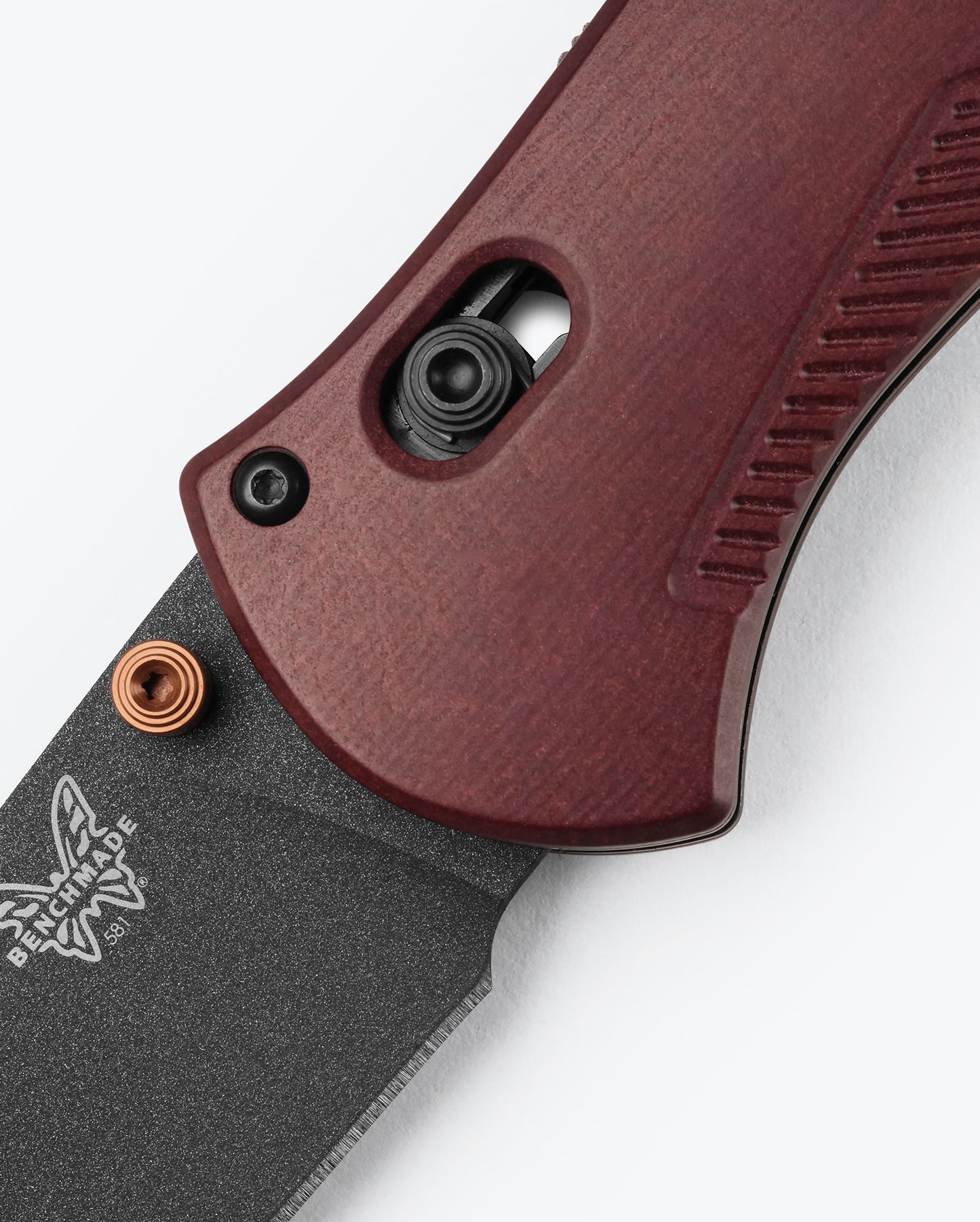Benchmade 581BK-04 Barrage with burnt copper thumb stud, lanyard hole and spine safety detail — ClassicBlades

