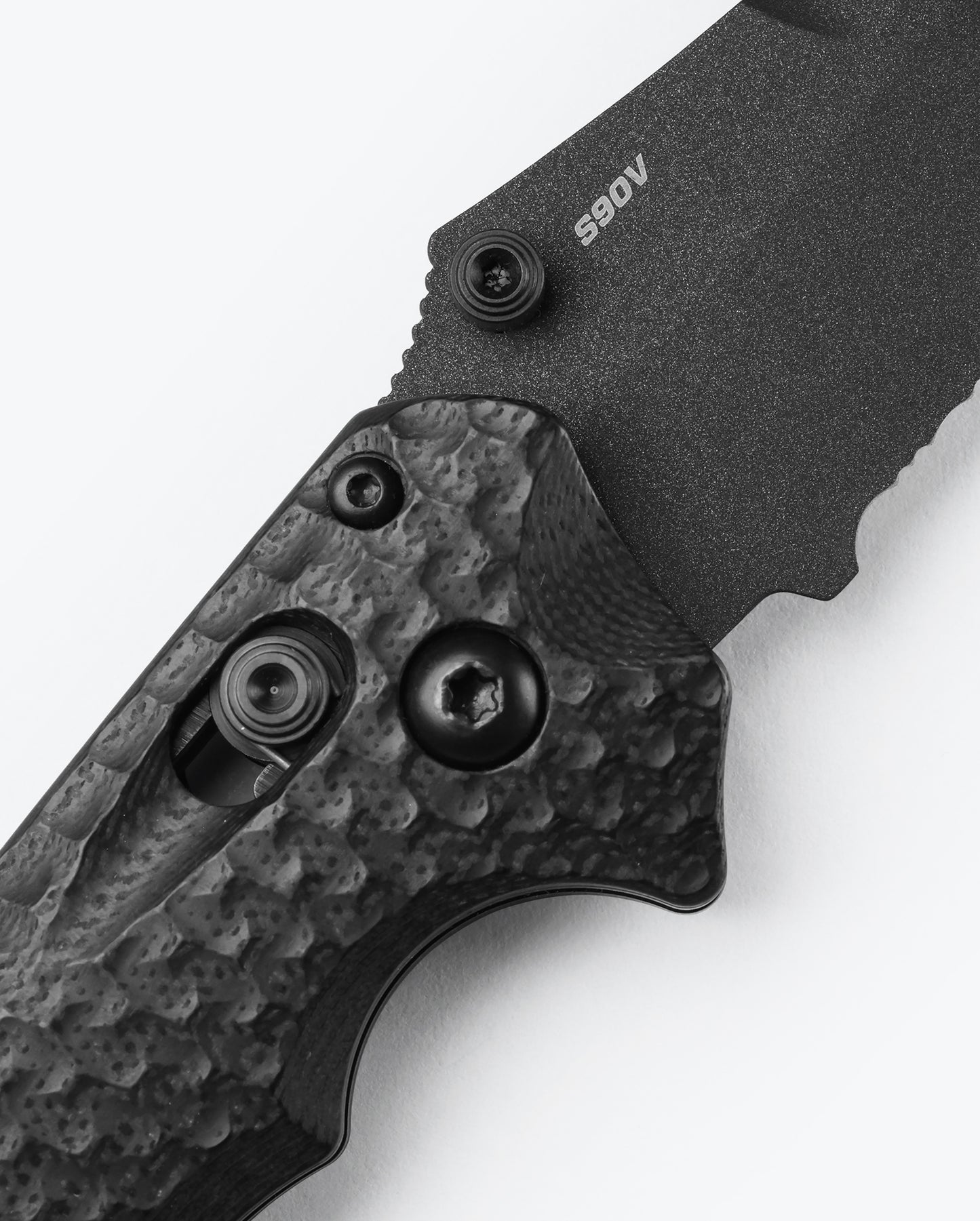 Benchmade 865SBK Mini Bedlam showing aggressive milling, finger grooves, chamfered backspacer and AXIS Lock — ClassicBlades