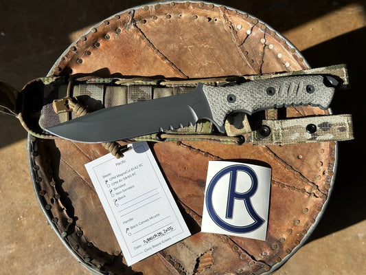 Chris Reeve Pacific PAC-1001 unused fixed blade knife, 6 inch CPM MagnaCut black Cerakote clip point, Black Canvas Micarta handle, with sheath