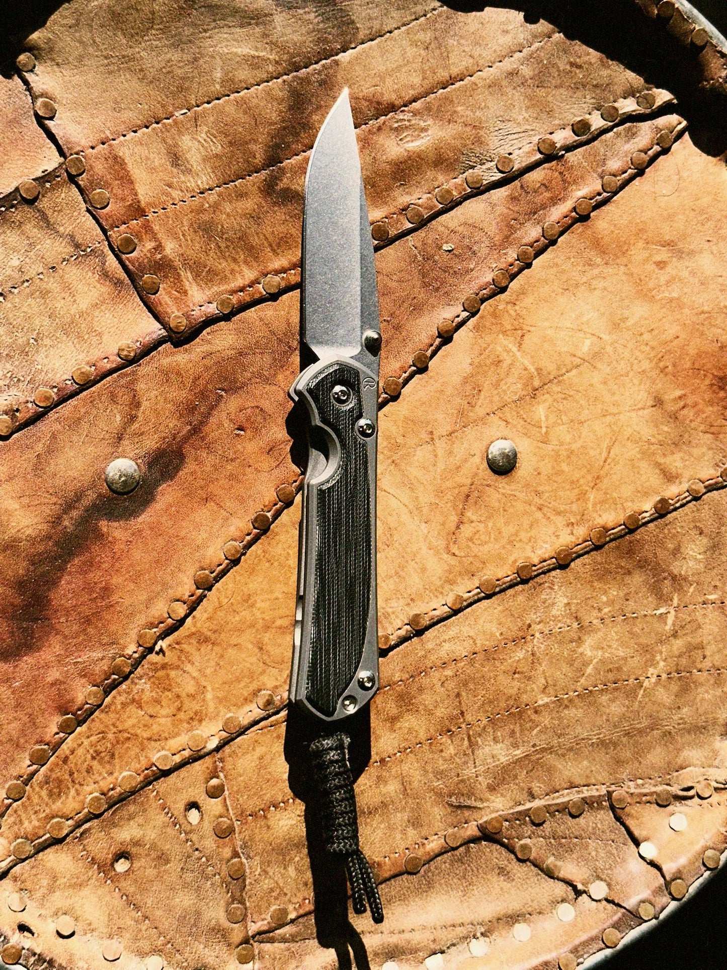 Chris Reeve Small Sebenza 31 S31-1200 folding knife open, Black Canvas Micarta inlay, CPM MagnaCut drop point blade, sandblasted titanium handle