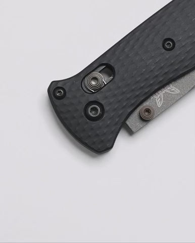 Benchmade 537SGY-03 Bailout tactical folding knife with black aluminum handle and gray serrated tanto blade