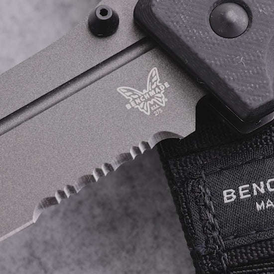 Heavy-duty tactical knife in hand, highlighting tank-like construction and reliability