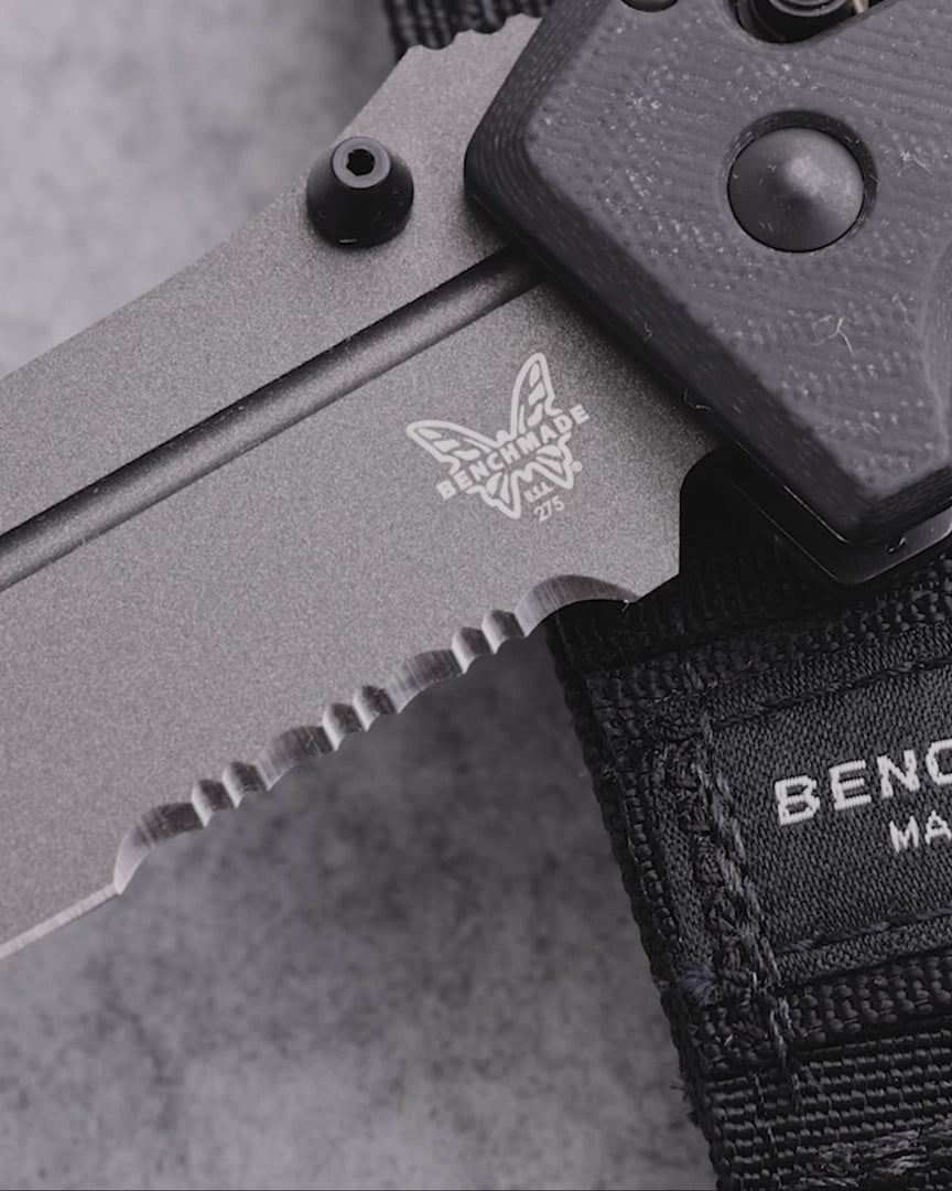 Heavy-duty tactical knife in hand, highlighting tank-like construction and reliability