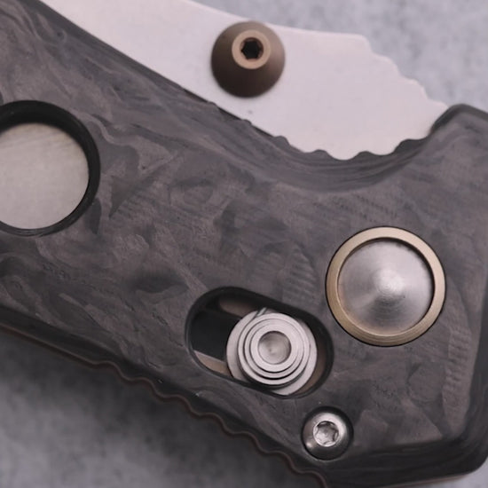Benchmade 273-03 Mini Adamas tactical folding knife with marbled carbon fiber handle and FDE PVD pocket clip detail— ClassicBlades