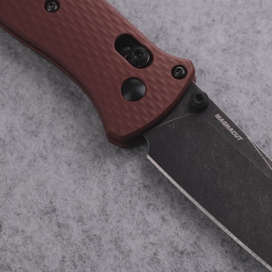 Benchmade 537BK-07 Bailout tactical folding knife with burnt copper aluminum handle and DLC battlewash tanto blade