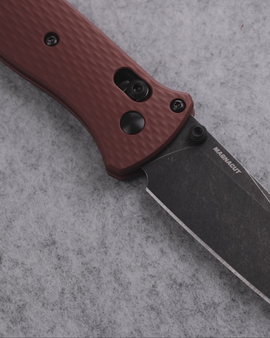 Benchmade 537BK-07 Bailout tactical folding knife with burnt copper aluminum handle and DLC battlewash tanto blade